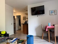 Convoluted floor plan and no area to lay out a mat and do stretching exercises. Old and worn out furniture. TV screen with ROKU but no live TV. Old dishes. No paper towels or dish rags. Stuffy and hot and no screen on main door to bring in air.