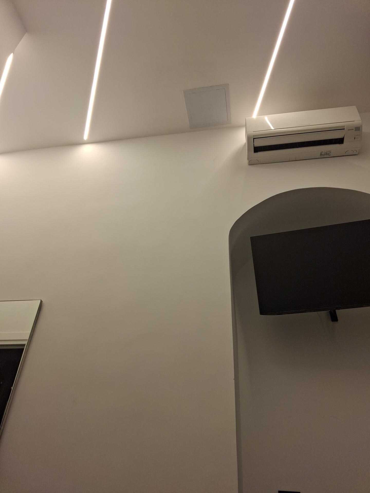 View from bed, room is small, but functional, clean and fairly new. Viennes Hotel