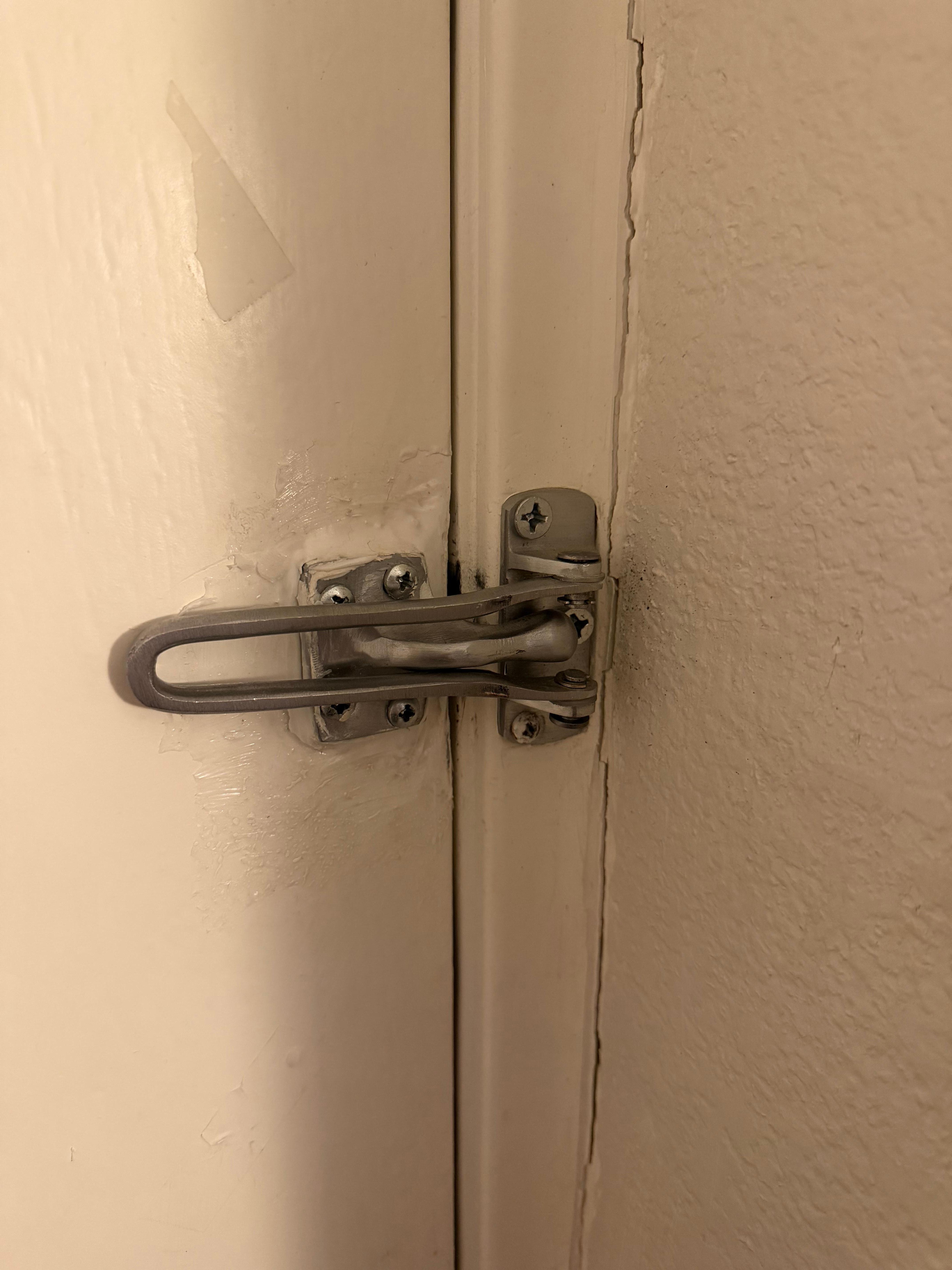 Front door latch was loose 