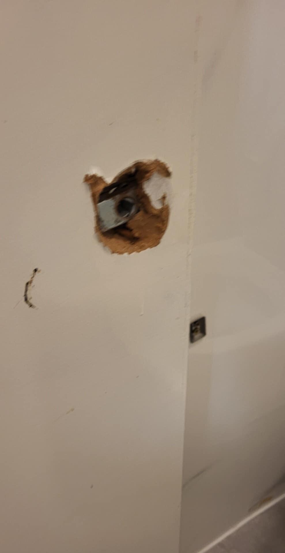 Door handle smashed off bathroom door