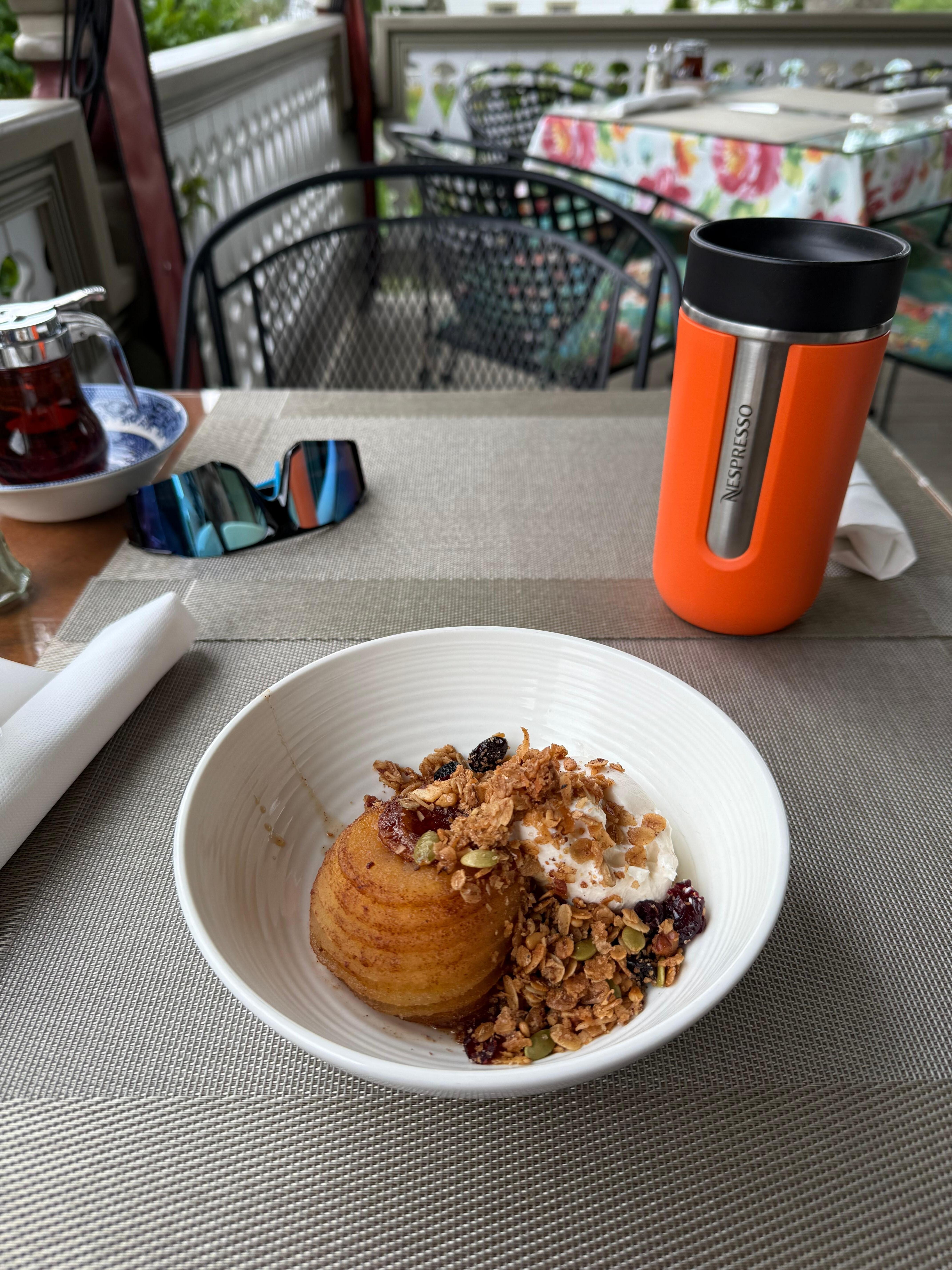 Greek yogurt with homemade granola and roasted sliced apple. 
