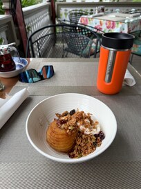 Greek yogurt with homemade granola and roasted sliced apple.