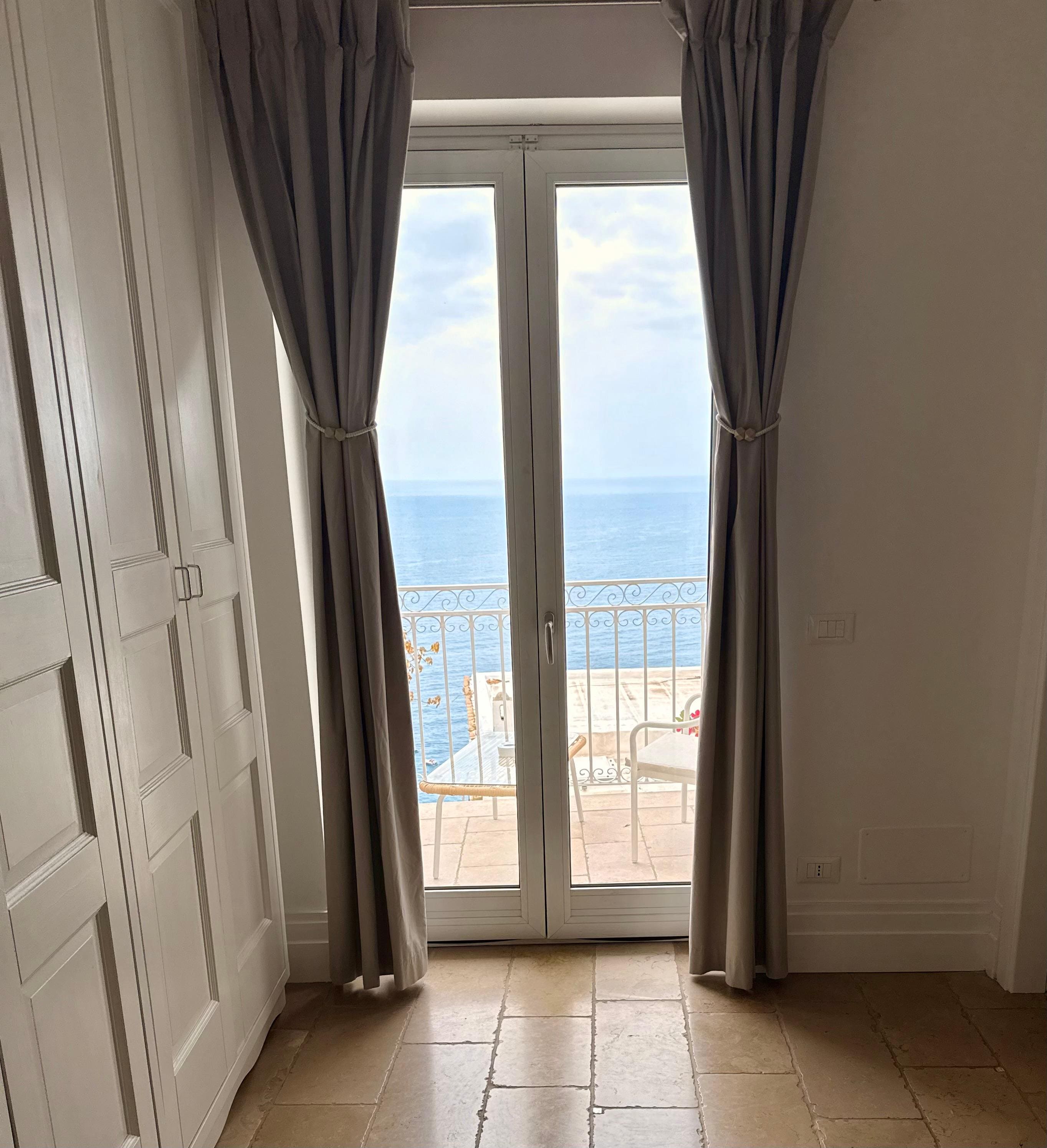 The balcony from inside the room.