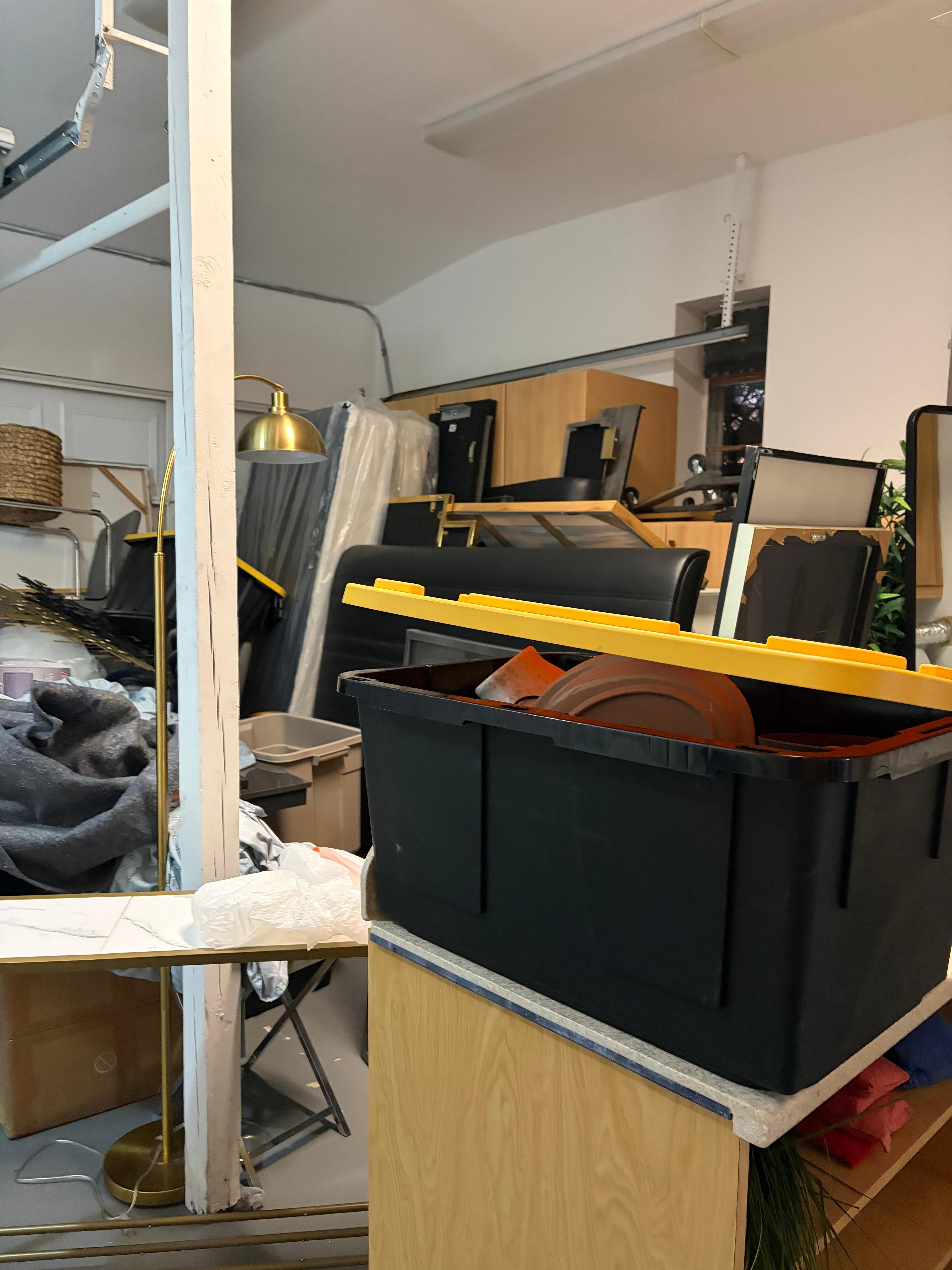 Garage with stuff piled