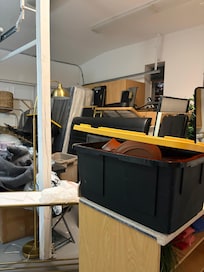 Garage with stuff piled