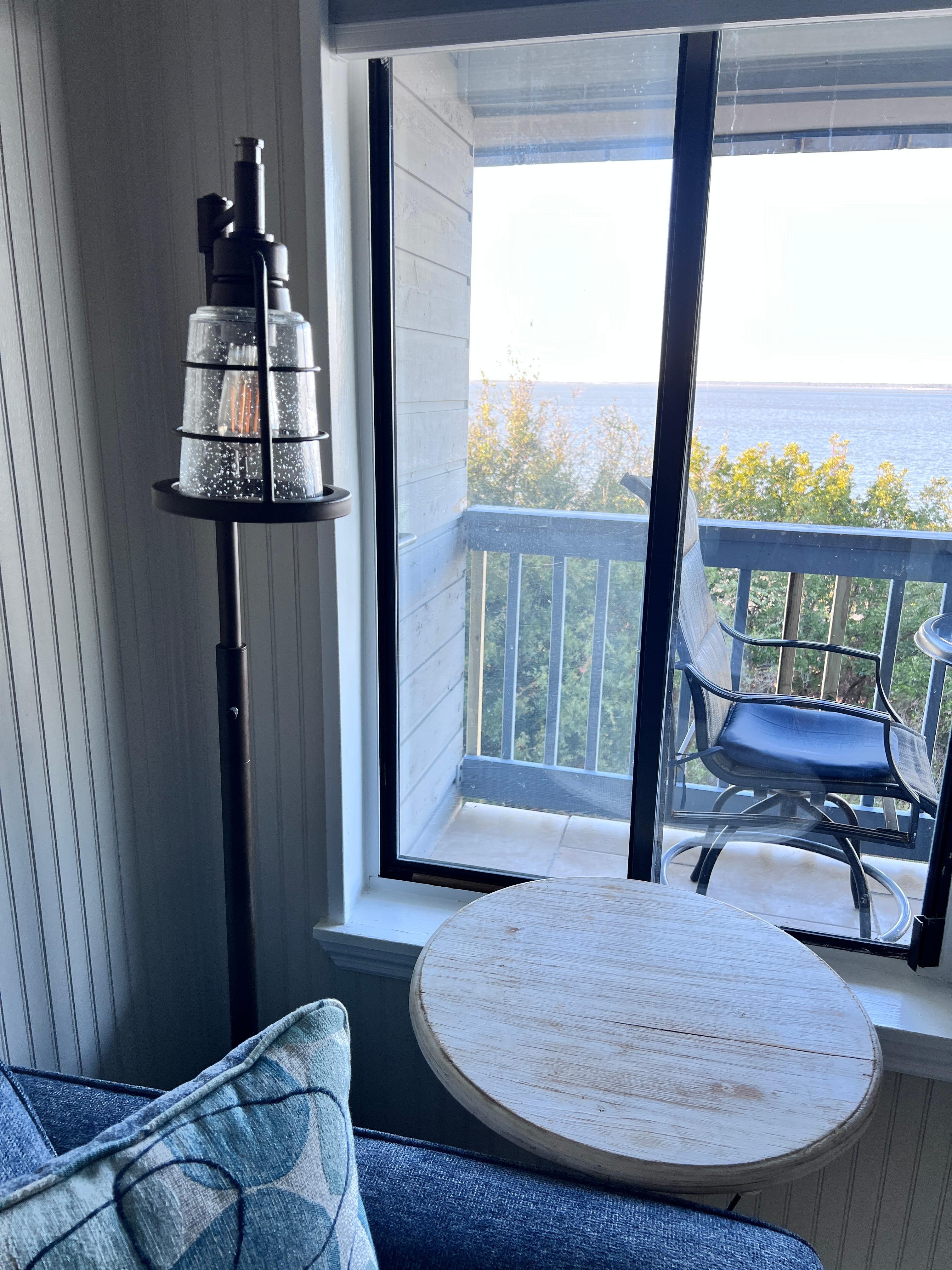 Living room window out to balcony and oceanfront