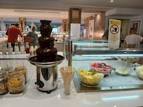 Chocolate fountain with fruit at breakfast!