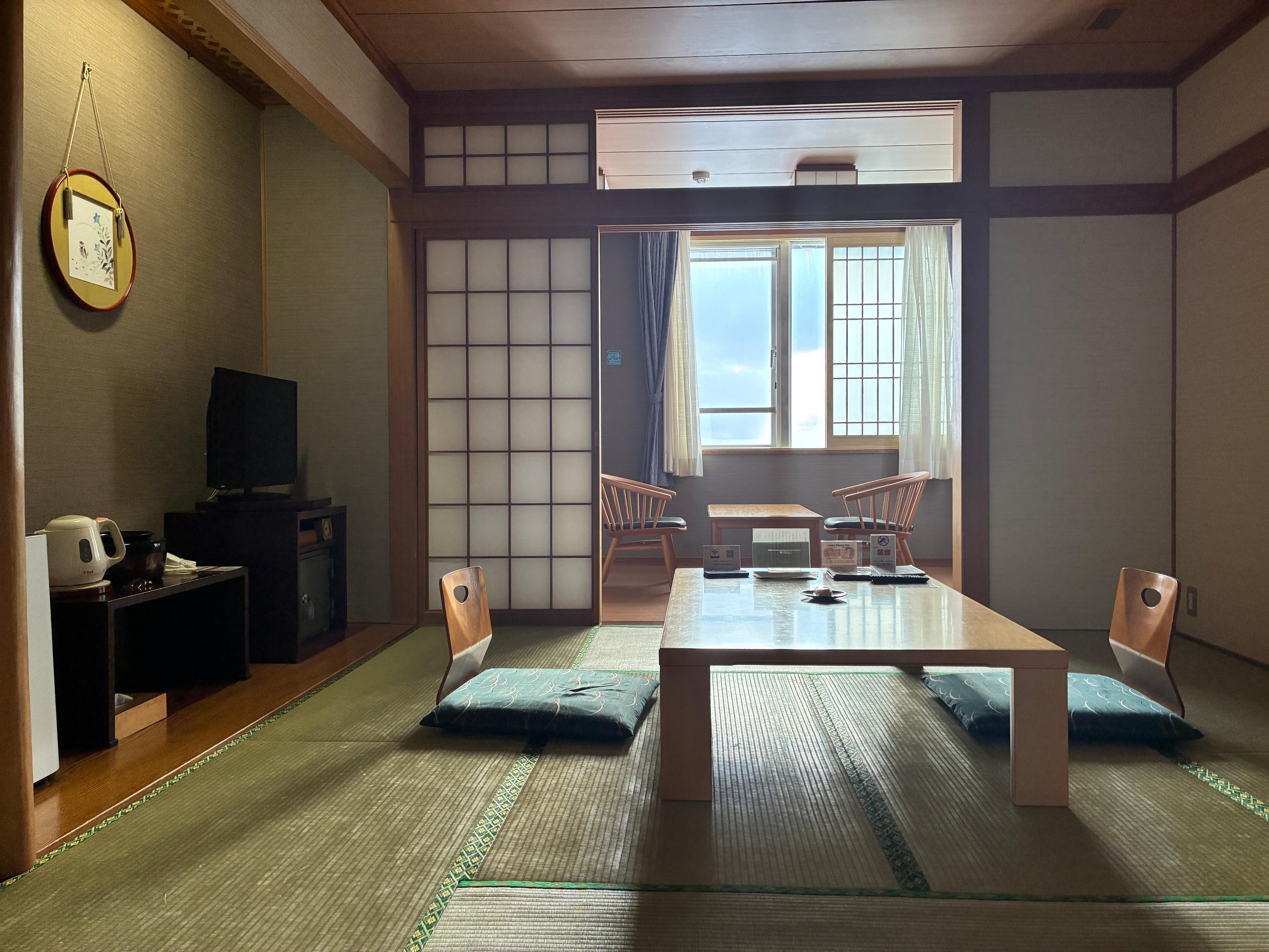 The room was beautiful and spacious, with a lovely view of the snowy scenery.