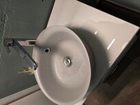 leaking faucet and Luke warm water in shower