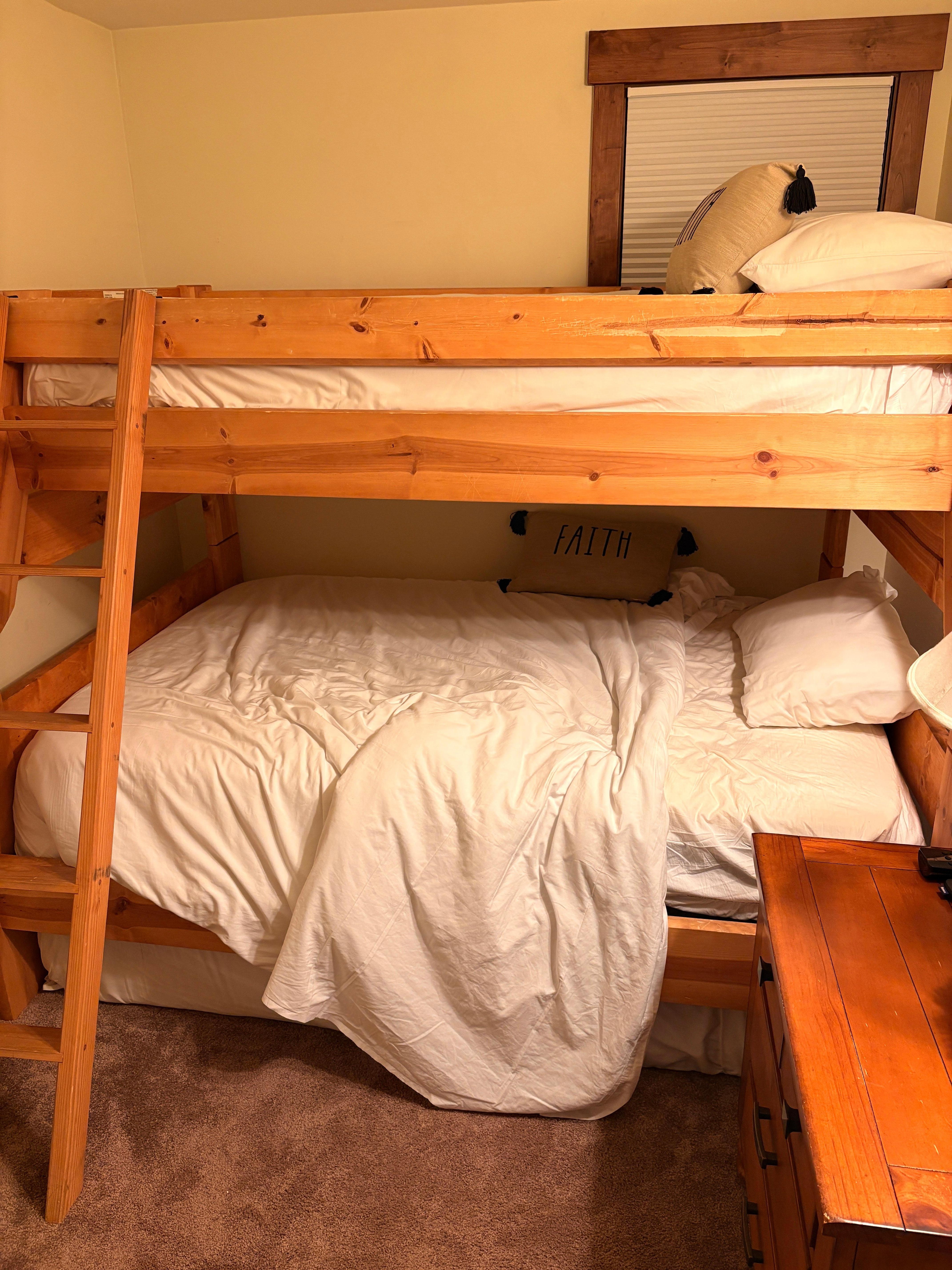 Guest bed unmade and as I found it upon entering unit.