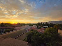 Sunset over the property from the 7th floor balcony.