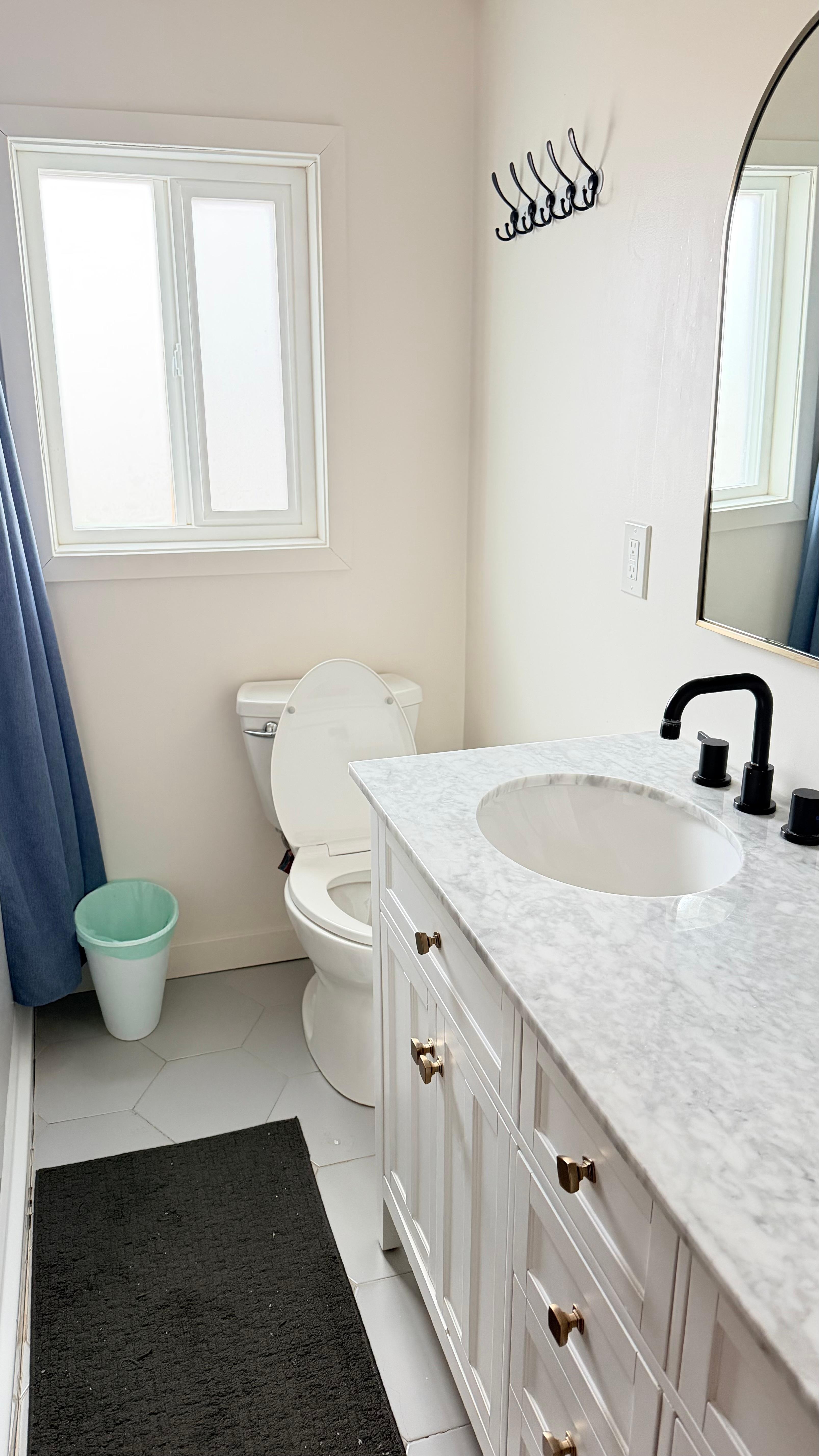 Was this vanity worth not be able to sit on the toilet? 