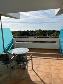 Glass table was loose and impossible to move. Some better furniture at balcony needed.
