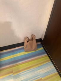 Trash left from previous guest behind entrance door