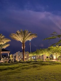 Watching a thunder storm brewing to the South, nice court yard and pool area.