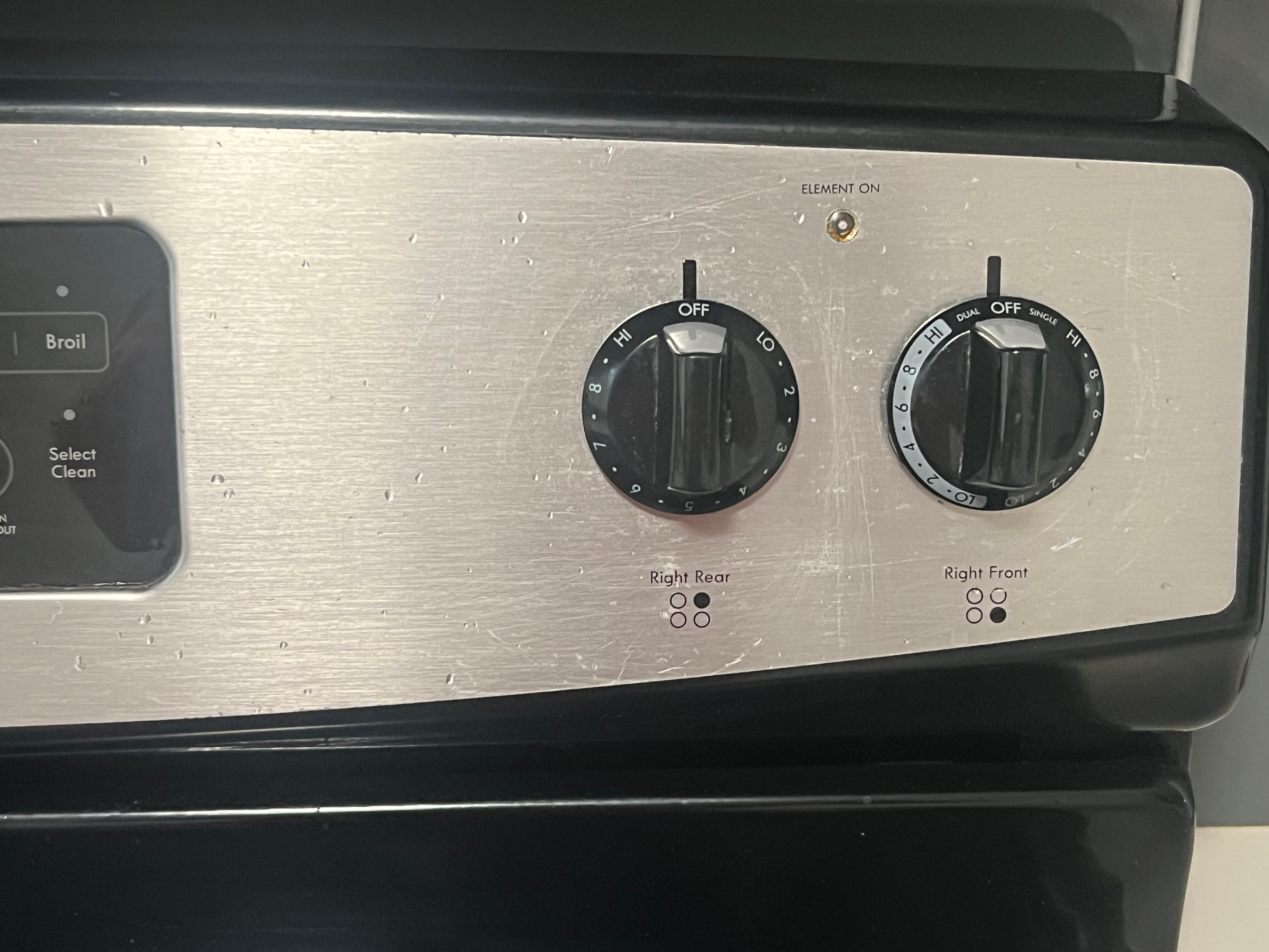 Stove had grease spatters all over it