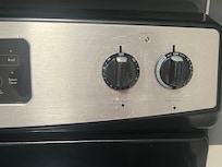 Stove had grease spatters all over it