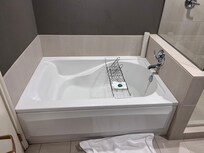 Soaking tub available in some rooms.