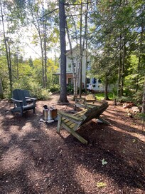 Back of house with fire pit