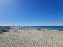 Public beach access to the left side from hotel