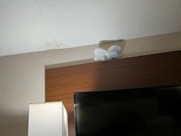 Smoke detector wrapped in plastic bag