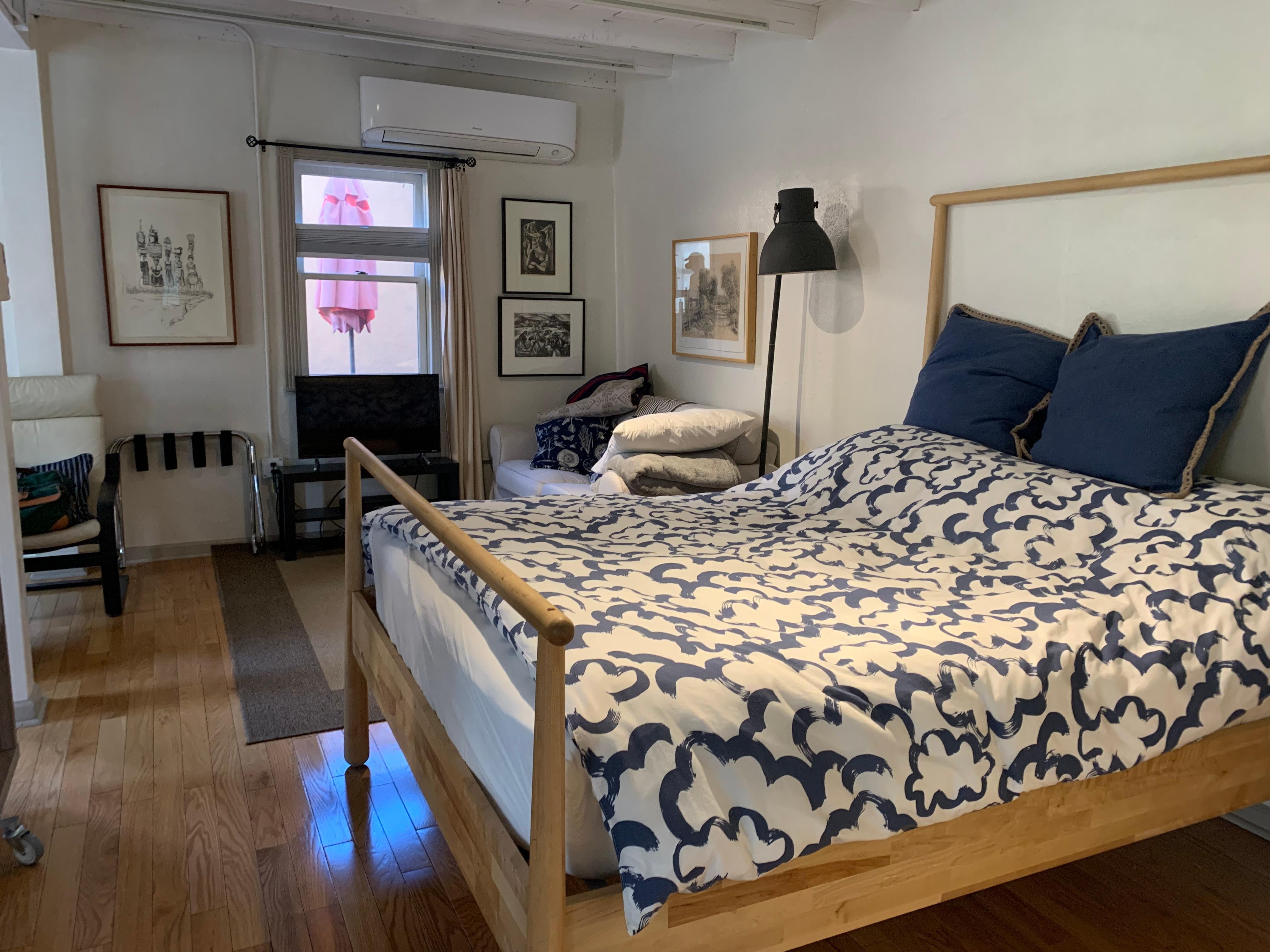 Just the right of room for a couple 
Good storage space for clothes, iron and board provided 