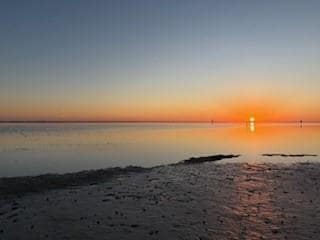 Sunrise over bay beach