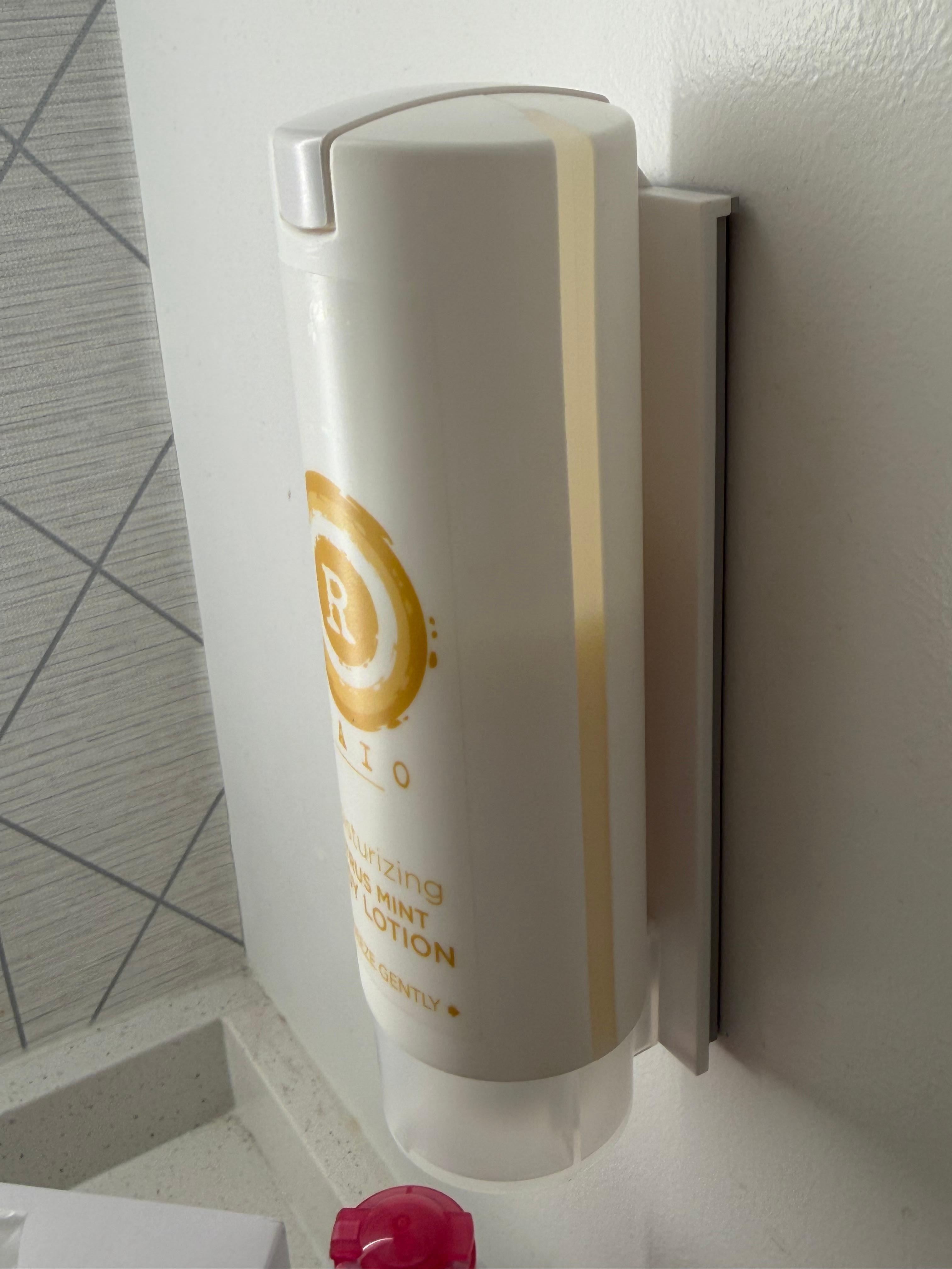 body cream in an unfilled bottle