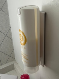 body cream in an unfilled bottle