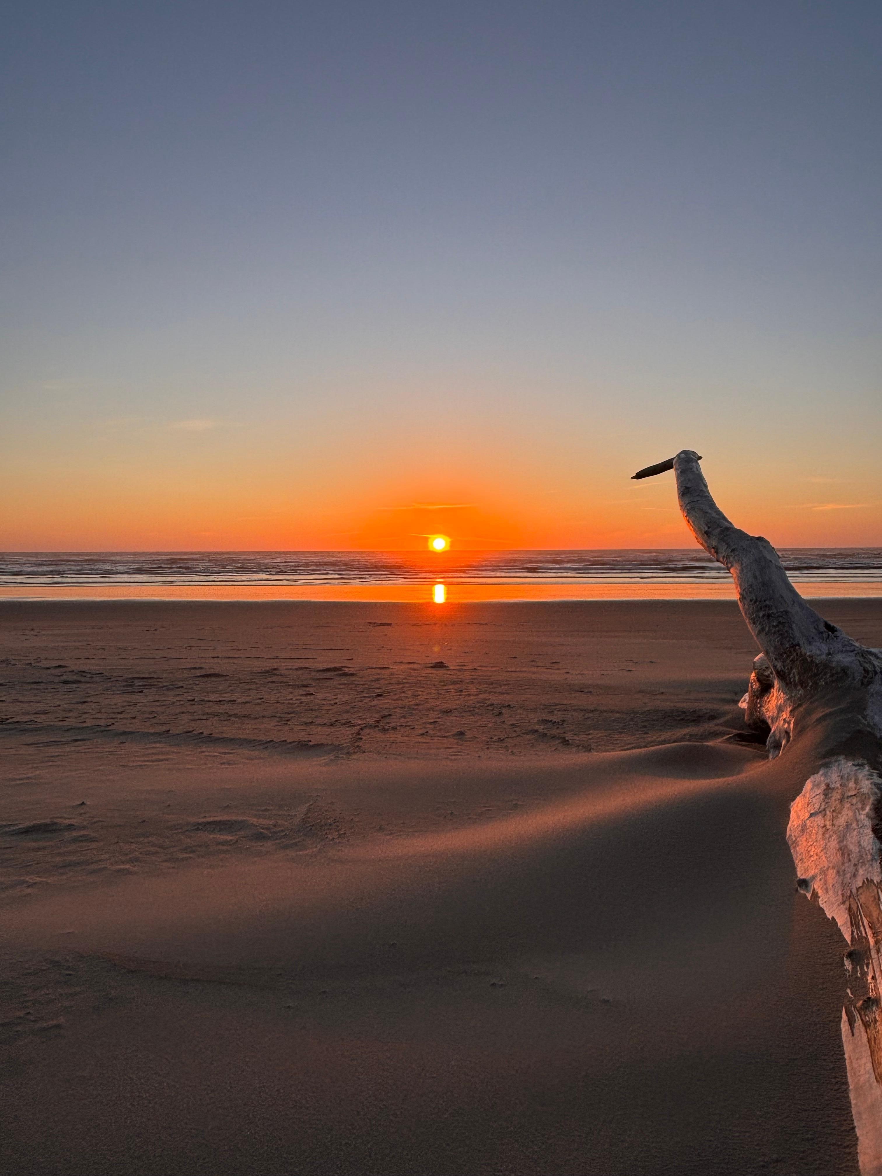 Sunset on the beach just a minute walk from back door of the house.
