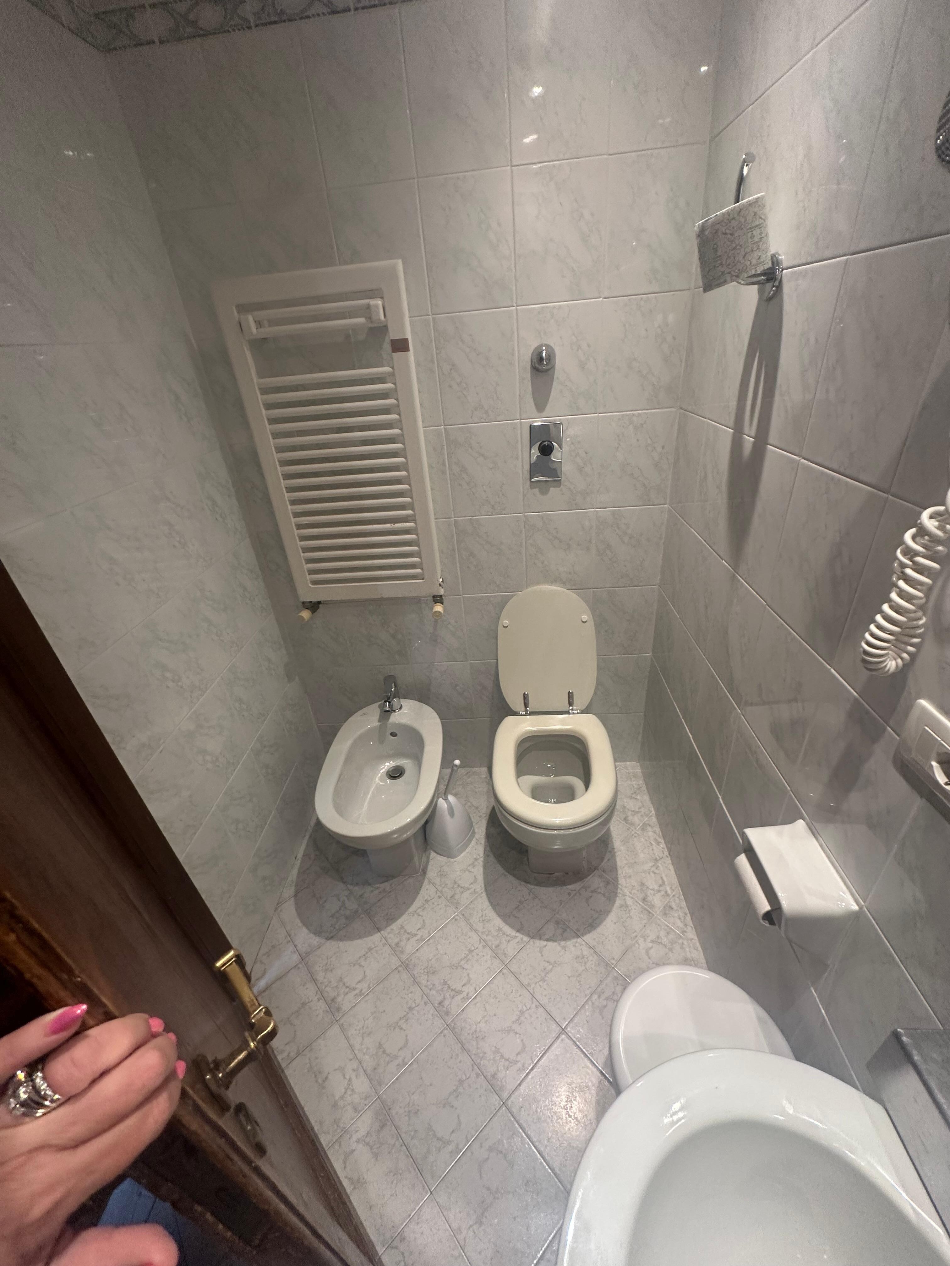 Door nearly touches the sink 