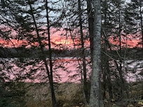 Beautiful sunrise from deck of cabin.