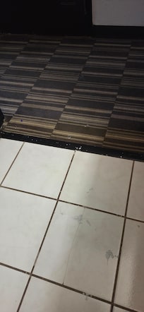 Broken tiles in bathroom