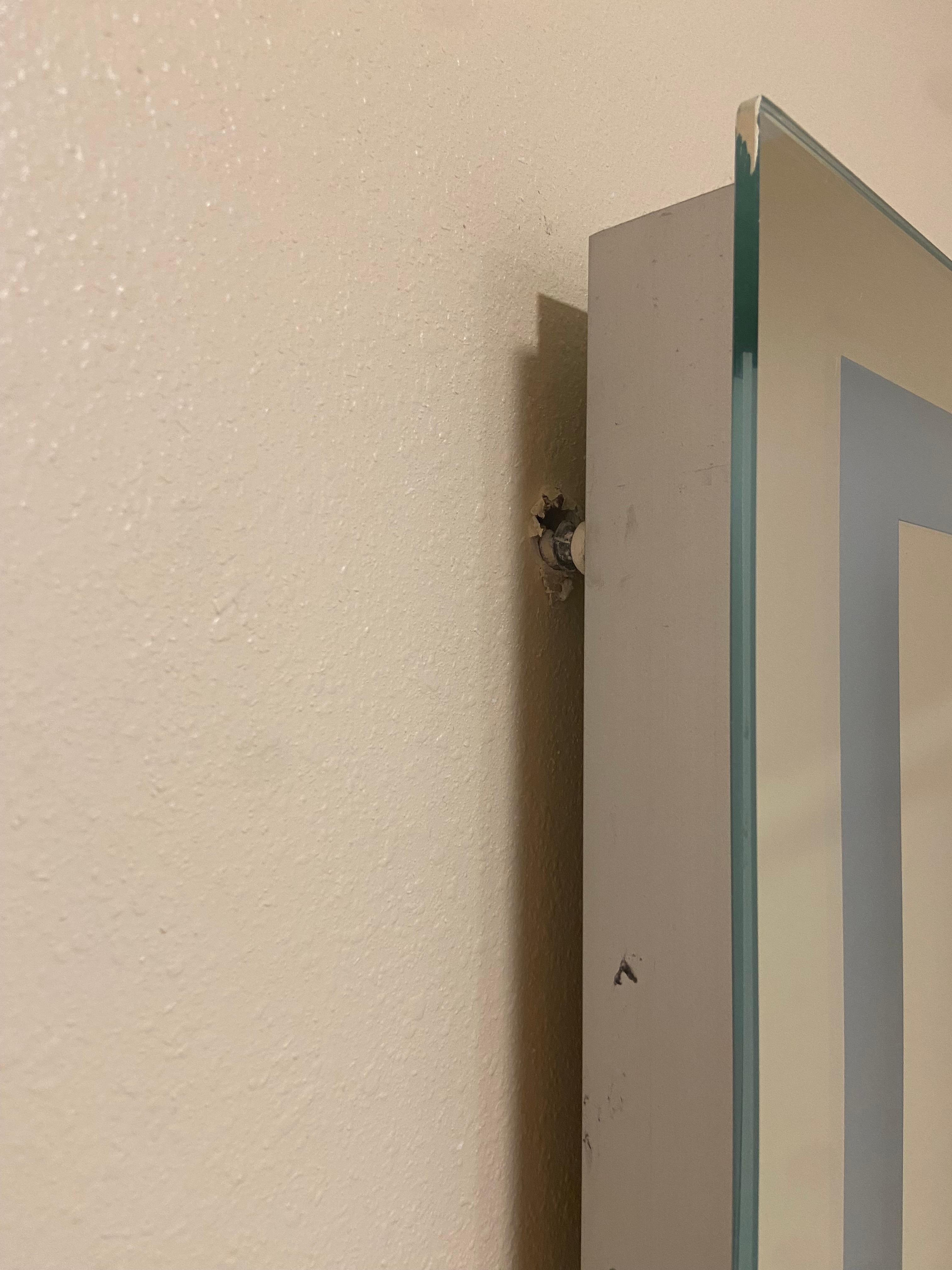 Mirror about to fall