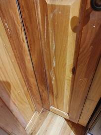 Paint dripped on wood in the bathroom