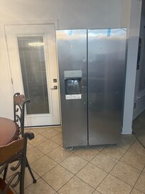 Random extra fridge in kitchen