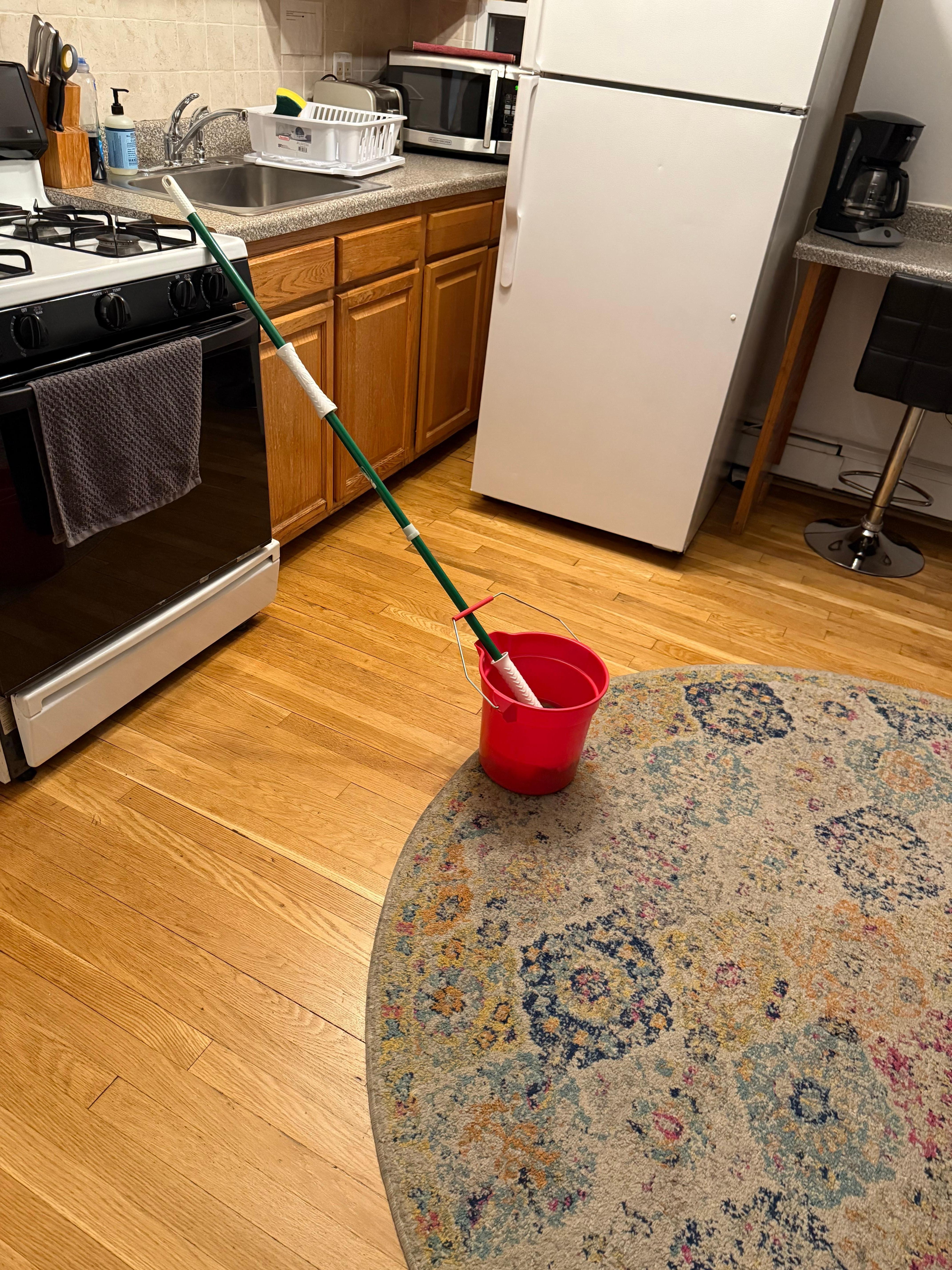 Mop bucket in the middle of the room when we arrived 