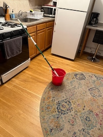 Mop bucket in the middle of the room when we arrived
