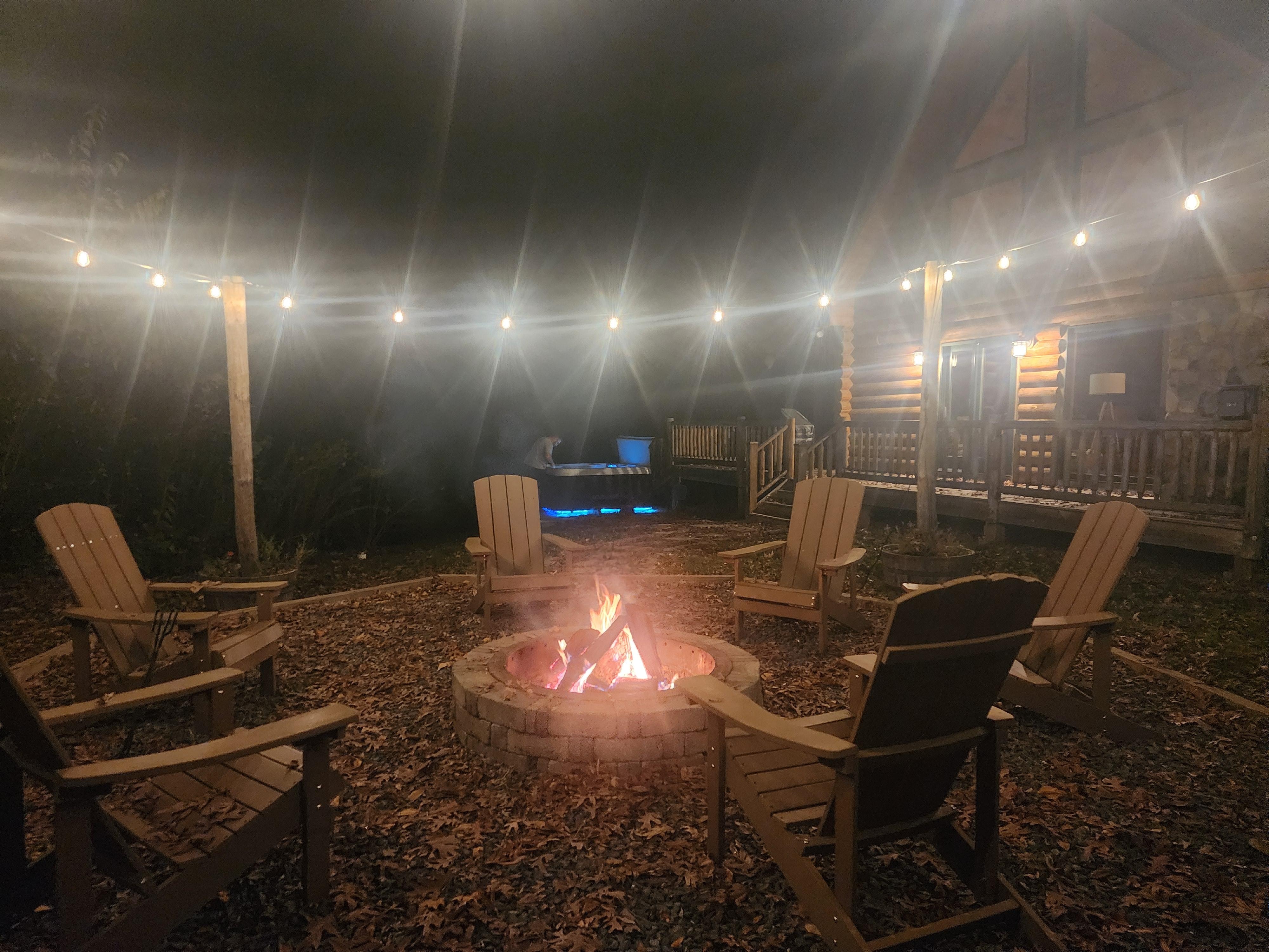 Fire pit & hot tub after dark