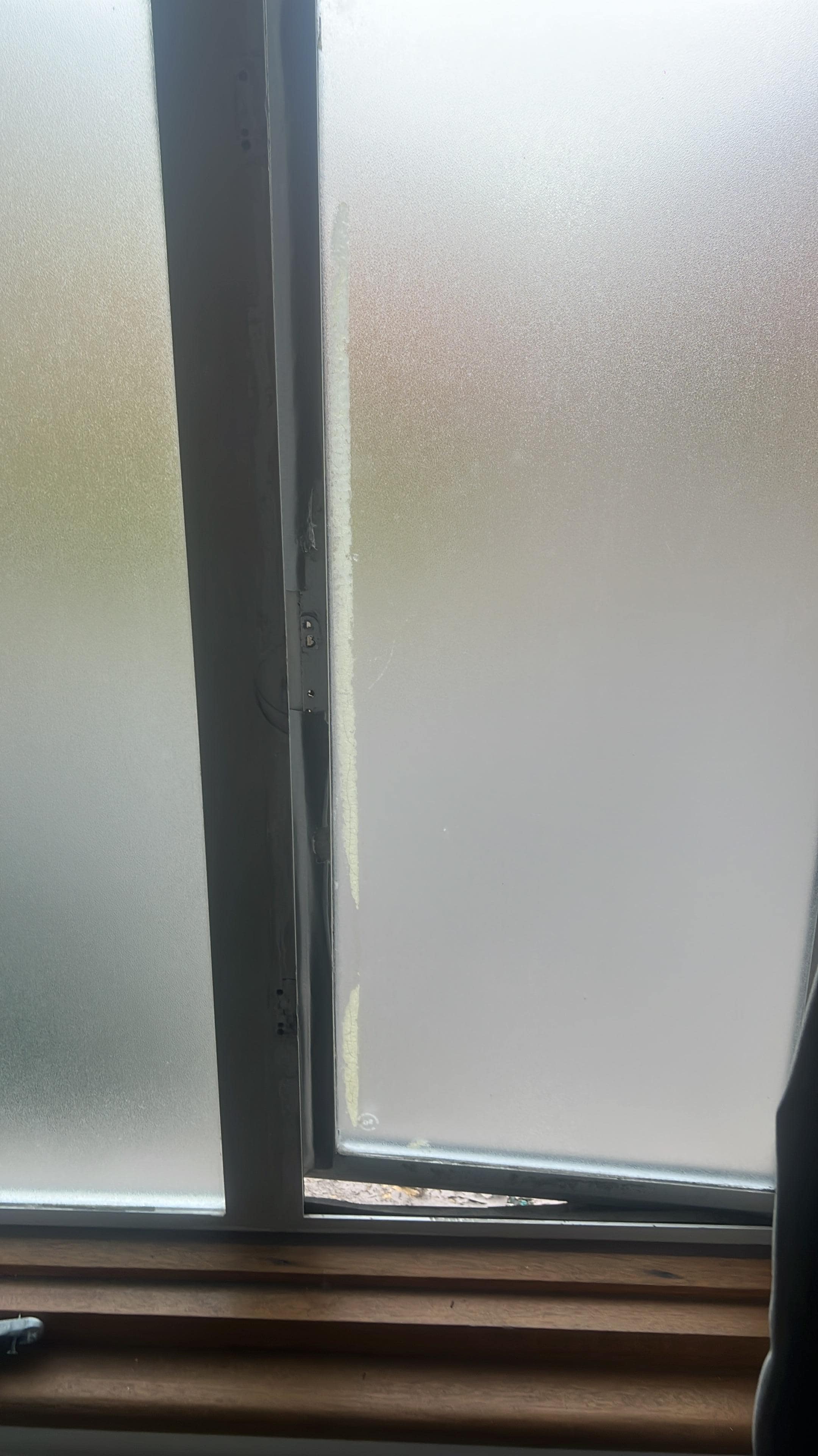 The window stuck open because the door handle fell off 