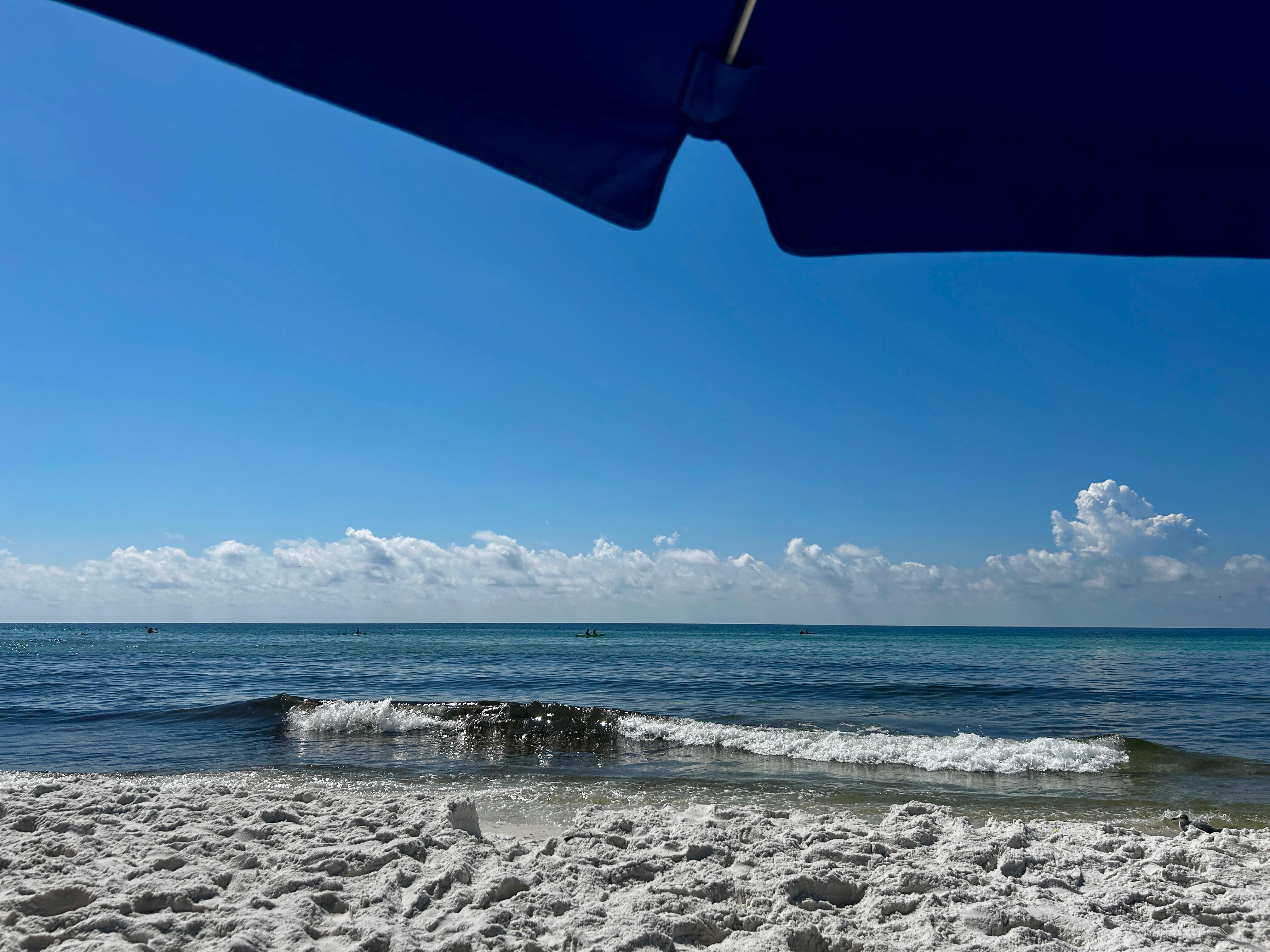 Perfect complimentary umbrella & chairs