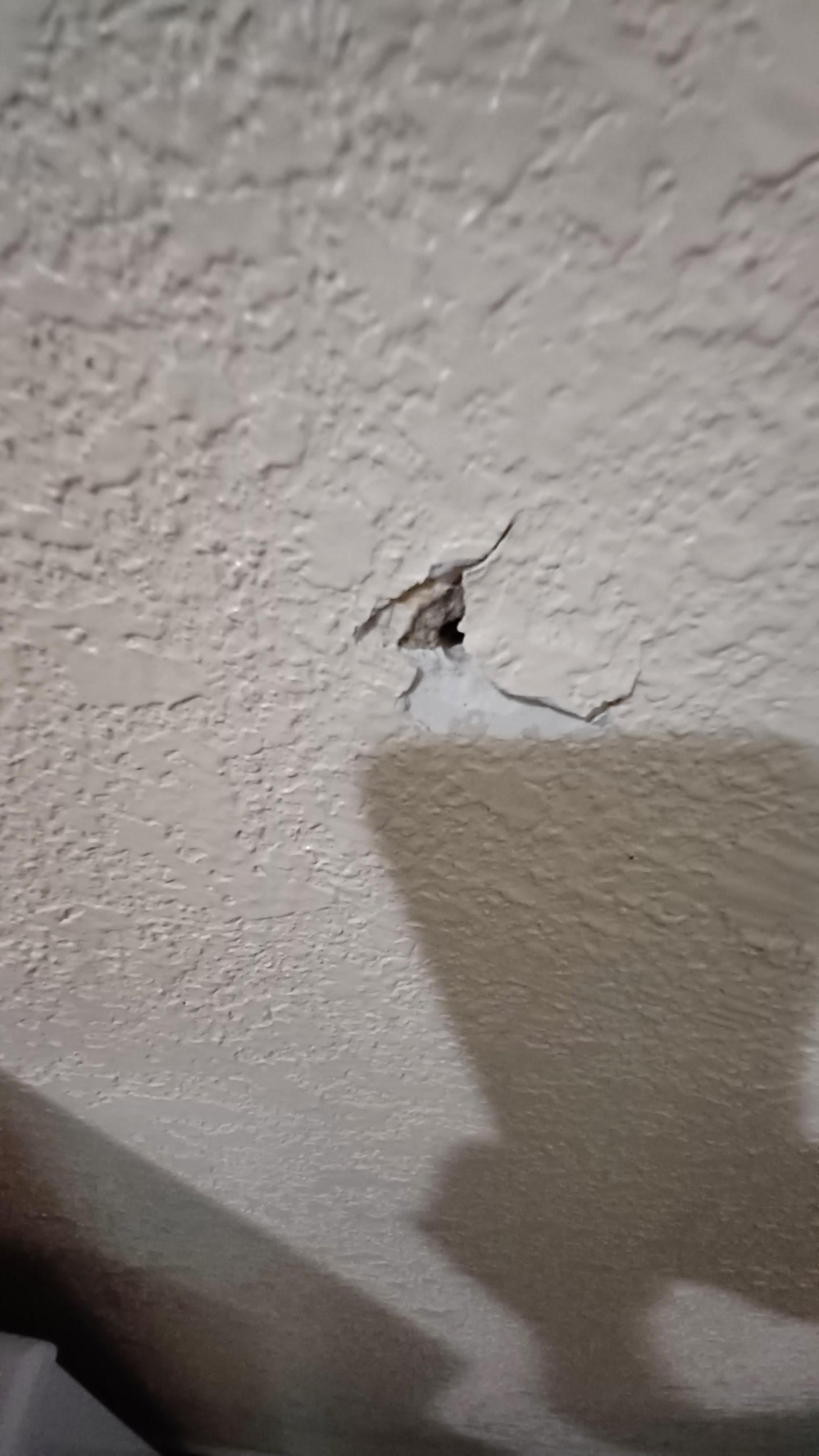 damage to wall