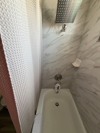 Shower tub is missing the plastic protector to keep water in the tub