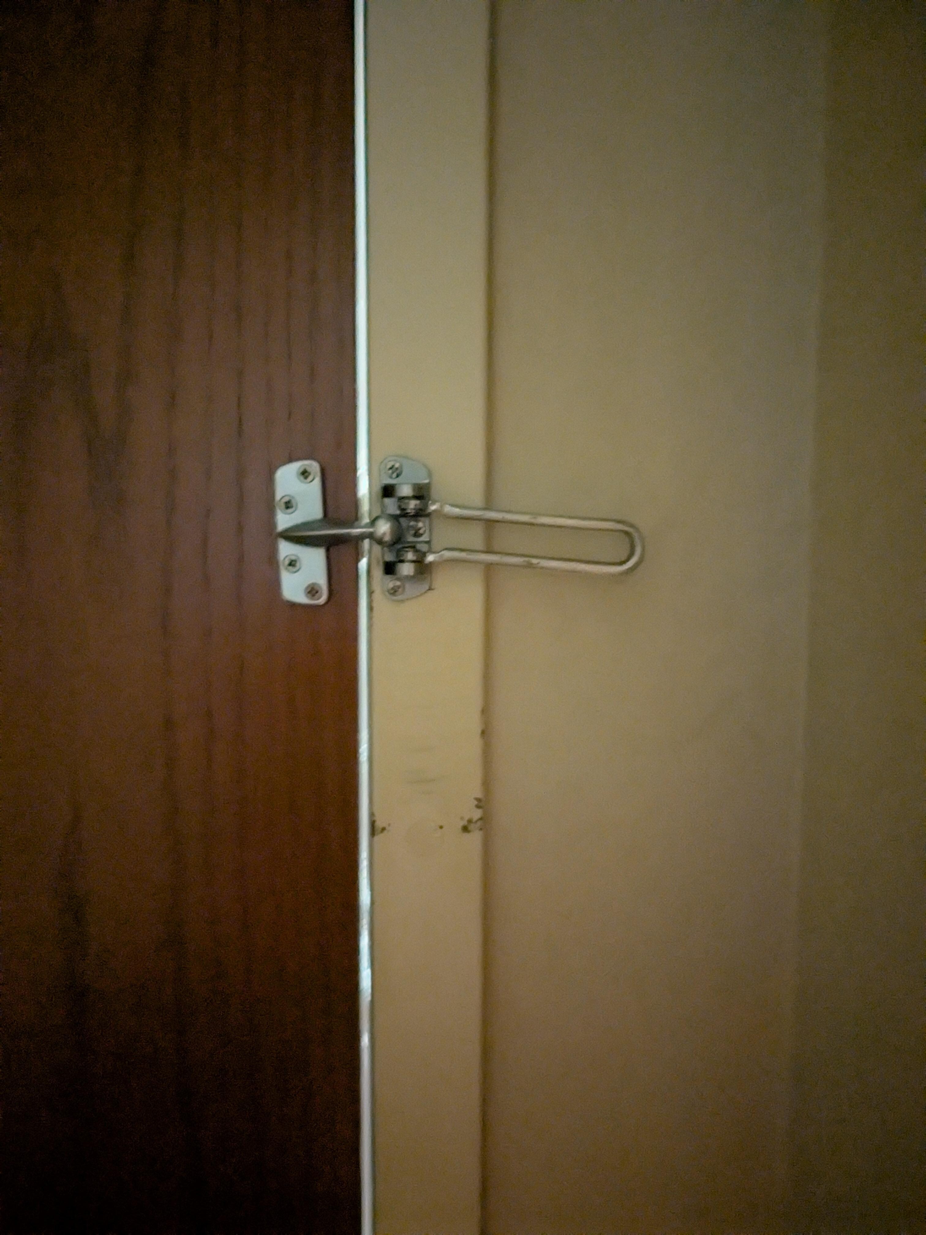 Latch on the door was not secured. 