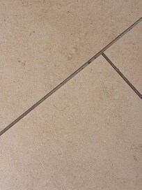 Hair and pubic hair on the bathroom floor upon arrival.