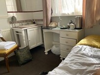 Single room with shared bathroom