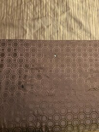 Cigarettes burn and stains on bottom portionof bed cover (bed 1)