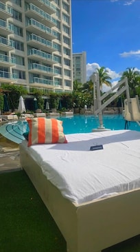 A view from the pool chairs and lounging area