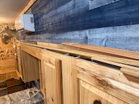 Wood trim that fell off this cabinet onto my guest