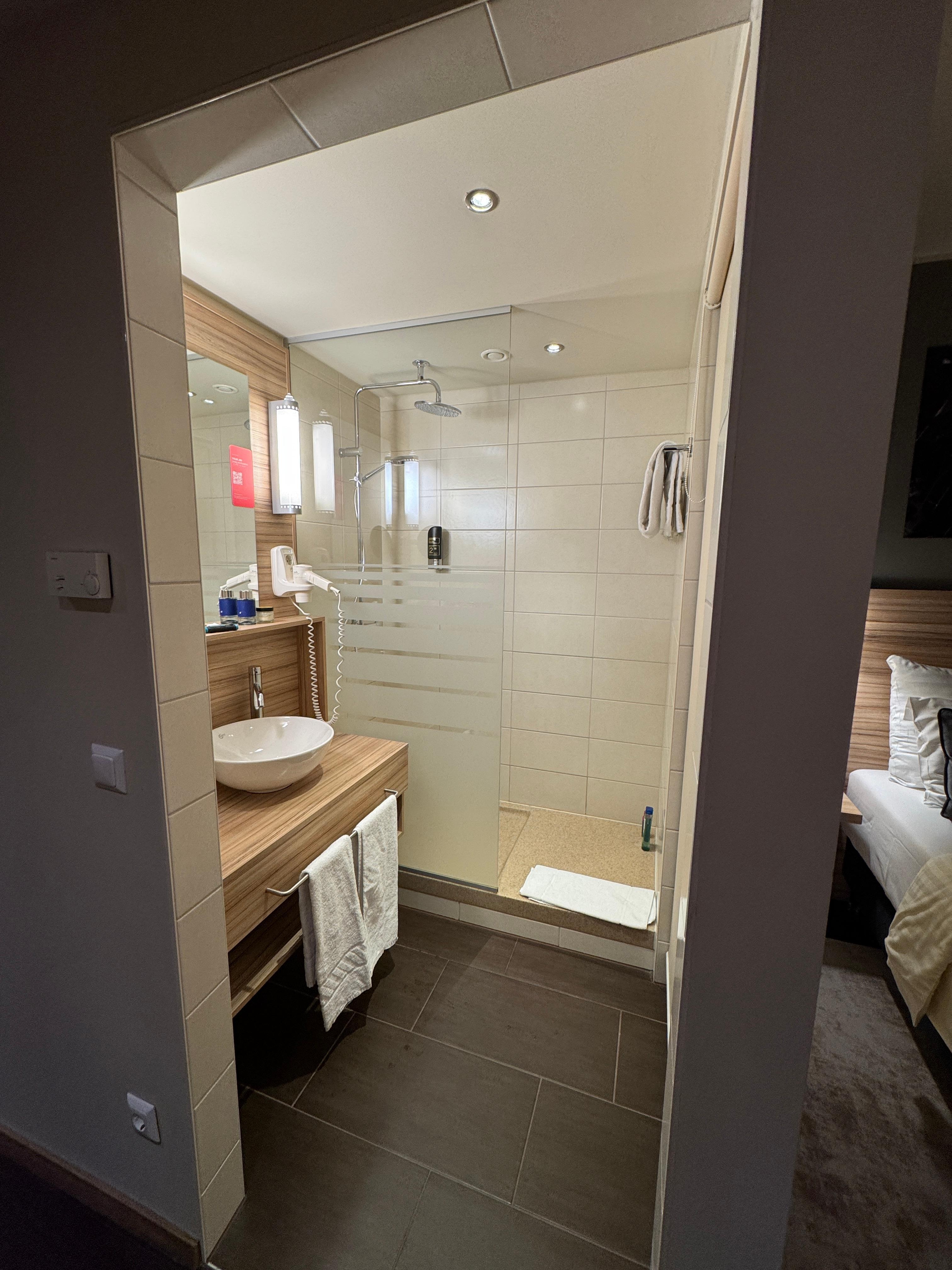 NO DOOR, photo taken from the hallway going from the bed area towards the room door